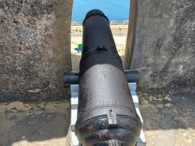 Fort Jesus, a majestic stone fortress with ramparts and cannons, overlooking the harbor and the Indian Ocean in Mombasa, Kenya.